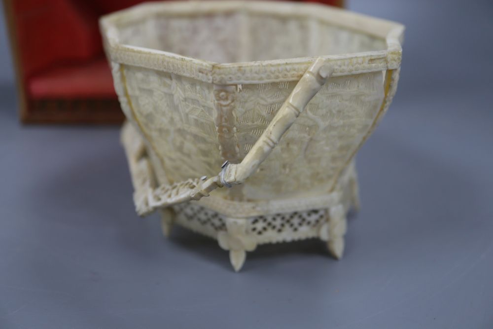 A Chinese ivory basket, boxed, width 11cm height 8cm